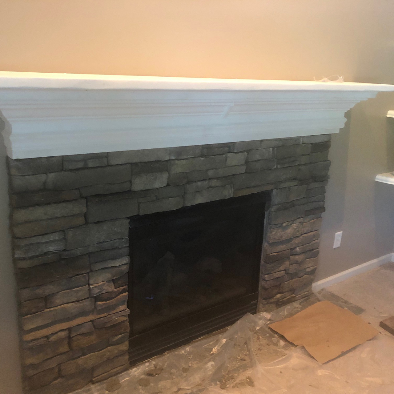 calandra fireplace with a mantle